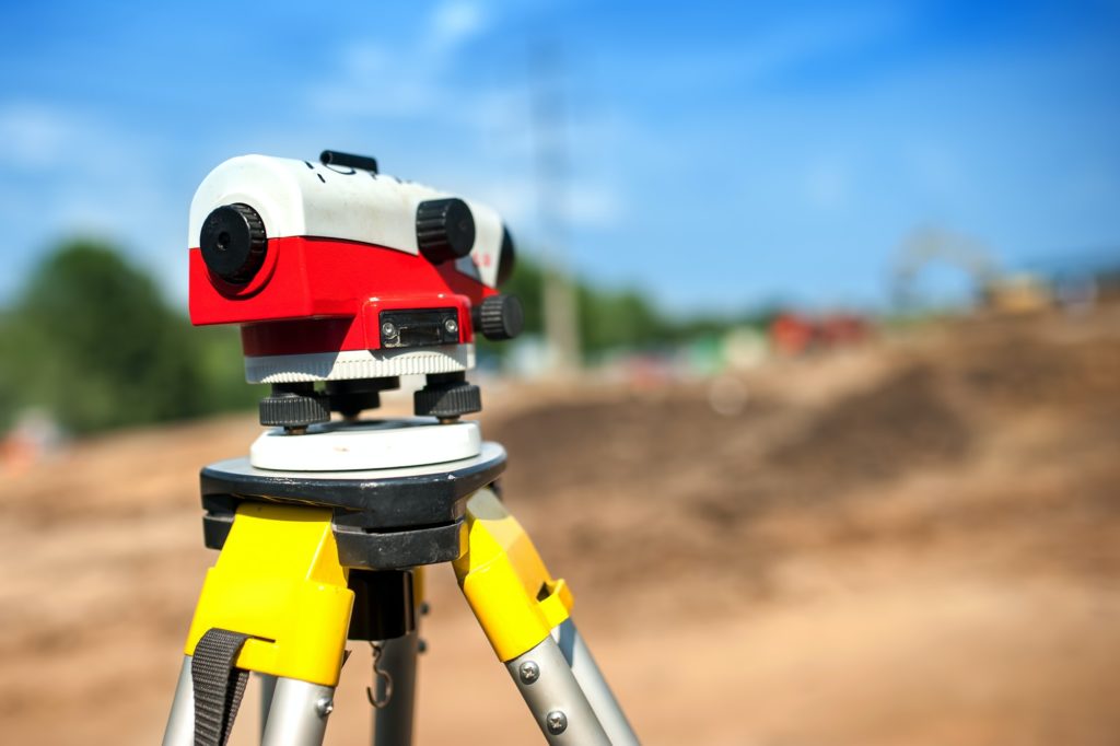close-up of theodolite measuring system or surveying engineering